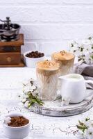 Dalgona whipped coffee with milk photo