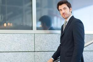 Handsome businessman portrait outdoor photo