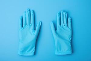 AI generated Sterile Pair of medical gloves on blue background. Generate Ai photo