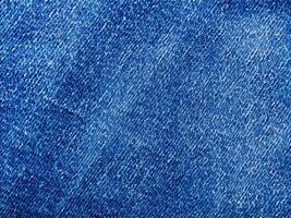 jeans background. close up of a blue jeans background photo