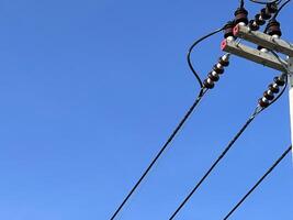 a power pole with a bunch of wires photo