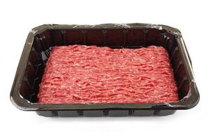 Minced meat in a plastic box photo