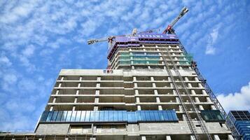 High-rise building under construction. Modern office building. photo