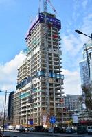 High-rise building under construction. Modern office building. photo