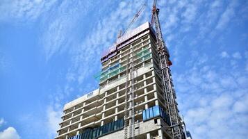 High-rise building under construction. Modern office building. photo