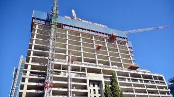 High-rise building under construction. Modern office building. photo