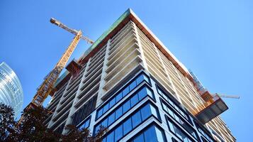 High-rise building under construction. Modern office building. photo