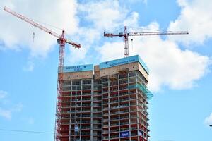 High-rise building under construction. Modern office building. photo