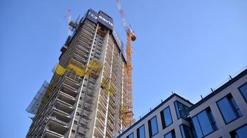 High-rise building under construction. Modern office building. photo