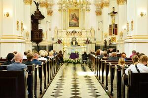 Wooden casket at a funeral - funeral ceremony in church photo