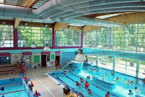 Swimming in the swimming pool photo