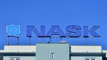 Warsaw, Poland. 16 February 2024. Sign Nask. Company signboard Nask. photo