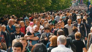 large group of people walking at city video