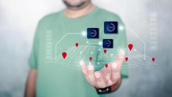 Men holding holograms virtual screen map to scan for new location for new startup photo