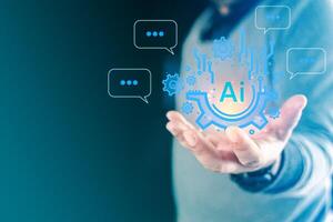 Speech bubble on chatbot with AI, Artificial Intelligence. Man showing technology smart robot AI. photo