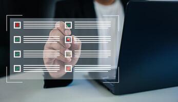 Online exam concept. businessman use pen choose correct answer in test on virtual screen. photo