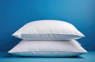 AI generated World Sleep Day, stack of two white pillows, bed linen, blue background photo