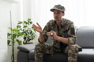 Soldier sitting and talking to his therapist photo