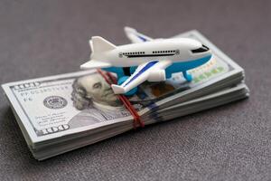 Model plane, airplane, money. Flat lay design. photo