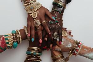 AI generated Vibrant Hands Showcasing Traditional Indian Jewelry. A vibrant close-up of diverse hands adorned with colorful bangles and rings, symbolizing unity and cultural beauty. photo