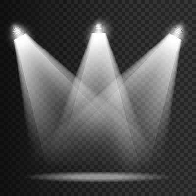 Divine light through a dark fog. The rays beam light on the floor. Spotlight on isolated background.