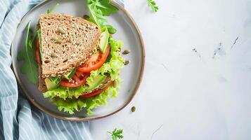 AI generated Fresh whole grain sandwich with lettuce and tomato on a ceramic plate, top view with copy space. photo