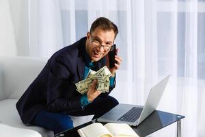 Businessman counting hundred dollar bills. Money and trade concept photo