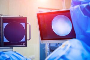 Medical devices, Interior hospital design concept. Interior of operating room in modern clinic, screen with tests closeup photo