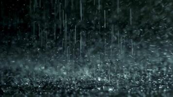 Slow motion heavy rain water drops on surface street video