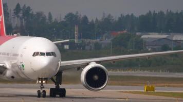 MOSCOW, RUSSIAN FEDERATION - JULY 29, 2021. Boeing 777-21B, ER, VP-BJF of Pegas Fly taxiing at Sheremetyevo. Footage plane on the taxiway. Tourism and travel concept video