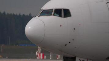 MOSCOW, RUSSIAN FEDERATION - JULY 29, 2021. Boeing 777-21B, ER, VP-BJF of Pegas Fly taxiing at Sheremetyevo. Footage plane on the taxiway. Tourism and travel concept video