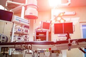 Equipment and medical devices in modern operating room. Operating theatre. Selective focus. photo