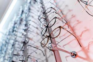 Eyeglasses in a store. Eyesight correction. Optics. Ophthalmology. photo