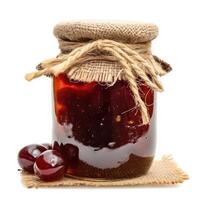 AI generated A jar of homemade jujube jam with fresh jujube, isolated on a white background. Ai Generated. photo