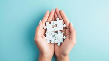 AI generated hands assemble jigsaw puzzle on pastel blue background, Ai Generated. photo