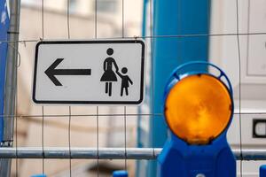 a barrier for pedestrians at a construction site photo