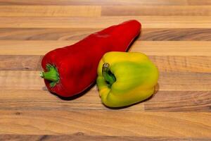 red and yellow peppers in the kitchen photo