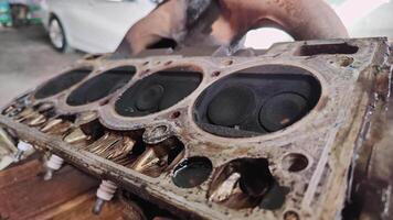 Dolly Shot of Car Cylinder Head at Repair Shop Footage. video