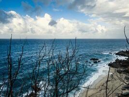 Stormy Ocean waves crashing on the beach photo