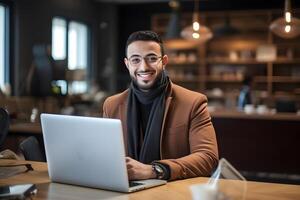 AI generated A smiling businessman sitting on workdesk with a laptop in front. photo