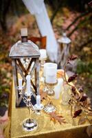 Wedding decorations in autumn forest. Beautiful wedding ceremony in autumn forest photo