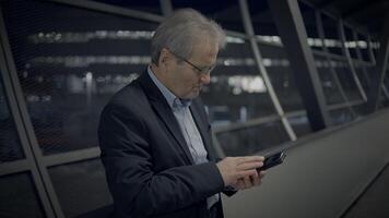 Upset Elderly Business Man in Suit Unappy Calling In Urban Town video