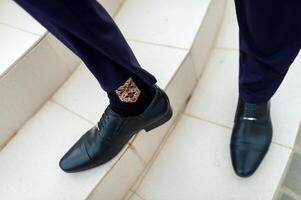 Preparations for the wedding. Fees of the groom. Stylish shoes closeup. photo