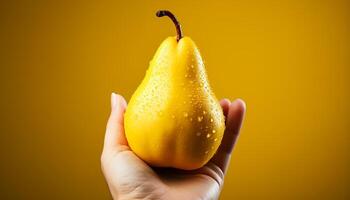 AI generated A hand holding a juicy, fresh, yellow apple generated by AI photo