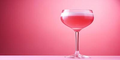 AI Generated Cocktail Glass On Pink Background. Closeup Elegant Alcoholic Drink. Party Beverage. Copy Space. photo