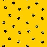 Black footprints paws vector seamless pattern on yellow background. Step, footstep, track background, wallpaper, print, textile, fabric, wrapping paper, packaging design