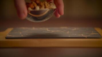 Mixed Nuts of Almonds Pecan Walnuts Cashews Hazelnuts on Wooden Table video