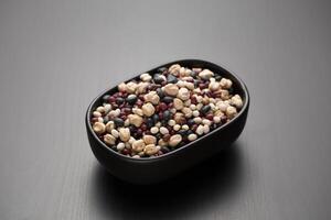 Mixed Beans in a black bowl. photo