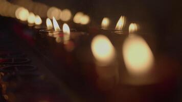 Wax Candles Night Lights Bokeh For Holy Religious Ceremony video