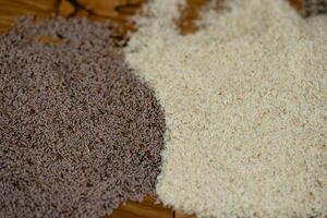 Psyllium seeds and psyllium husks on olive wood photo